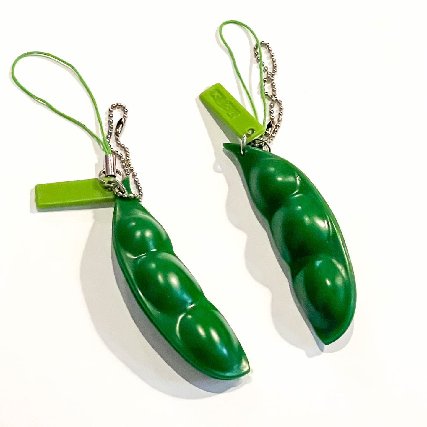 Pea pod squeezer