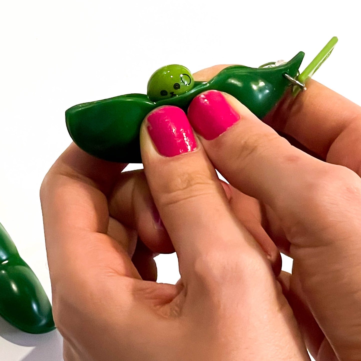 Pea pod squeezer