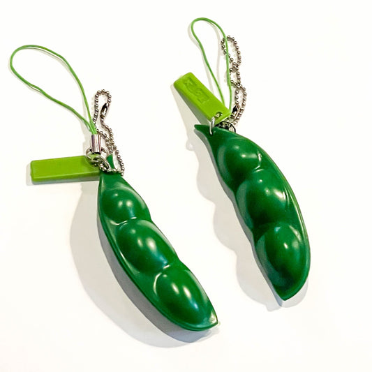Pea pod squeezer